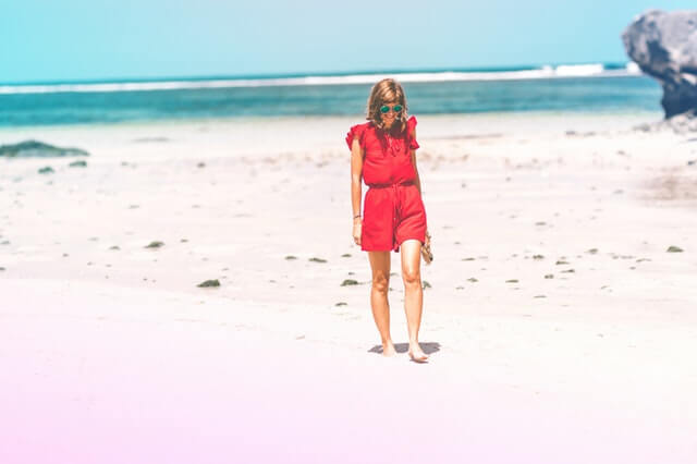 Girl walking on beach