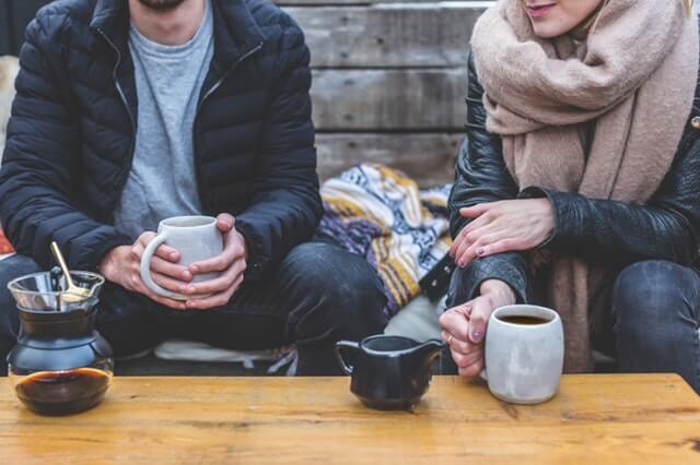 two people sitting down